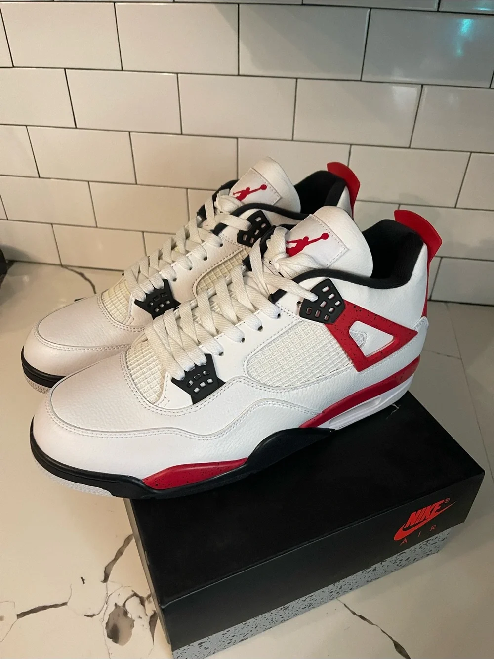 Men’s Retro 4 Red Cement Size 14.